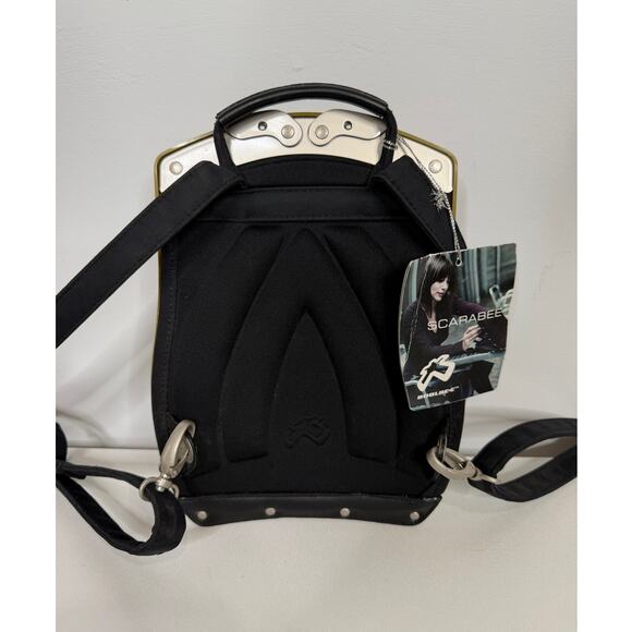 Boblbee Scarabée hard-shell mini backpack St Tropez model in metallic gold. main image 12